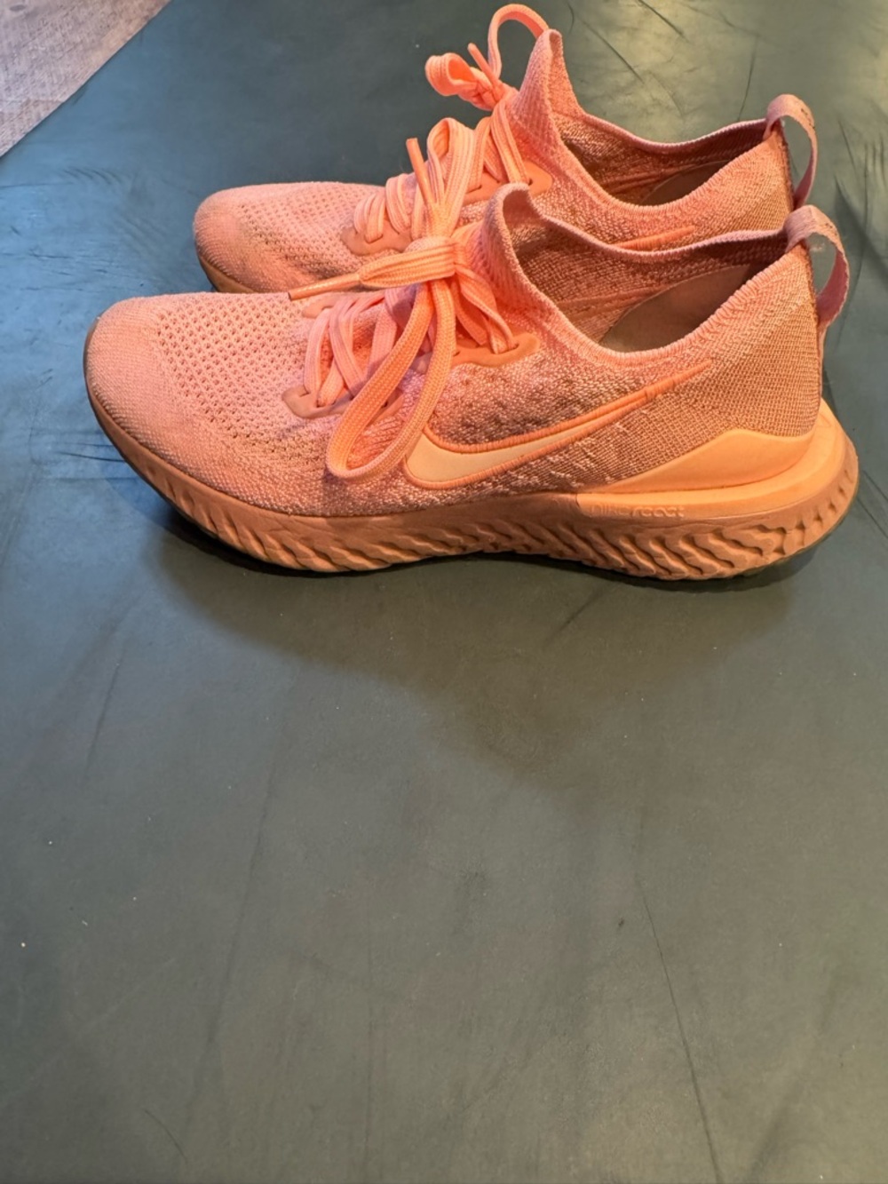 Nike Flyknit Low-Top Sneakers in Coral Orange